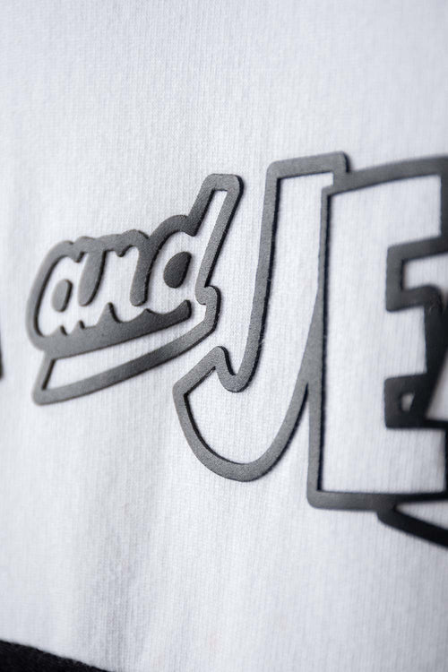 Card slide image -  BUZO DE TOM Y JERRY GRIS BLANCO Y NEGRO CERRADO GÉNERO NEUTRO