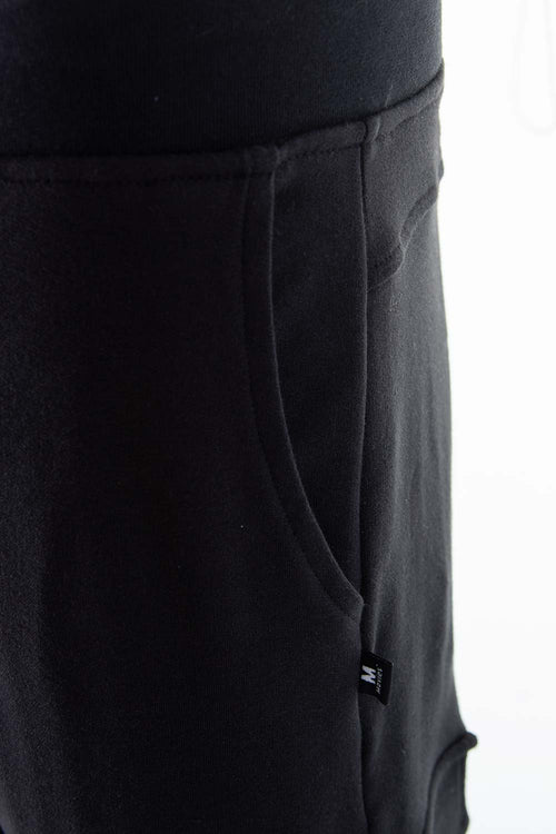 Card slide image -  JOGGER DE MOVIES NEGRO PARA HOMBRE