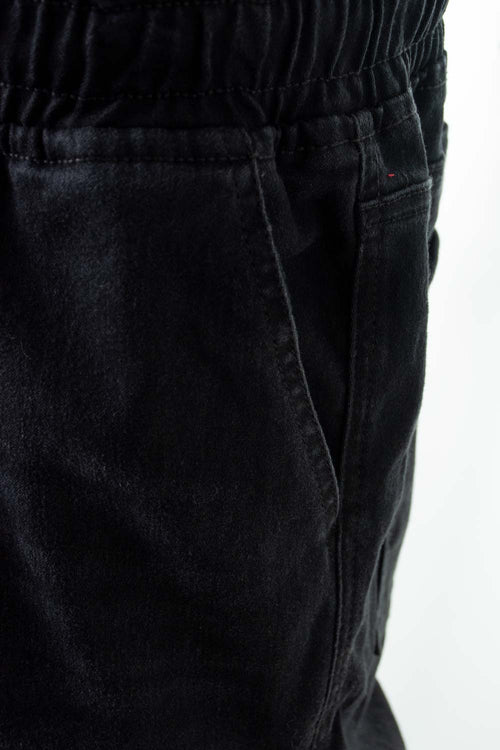 Card slide image -  JOGGER DE MOVIES NEGRO PARA HOMBRE