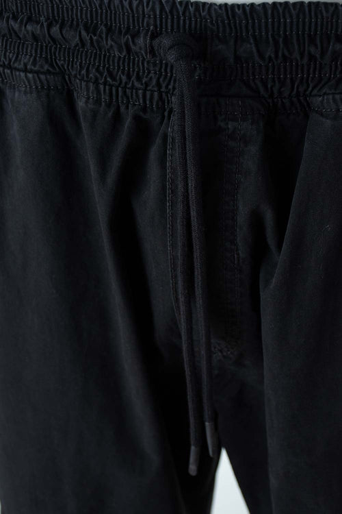 Card slide image -  JOGGER DE MOVIES NEGRO CON BOLSILLOS PARA HOMBRE